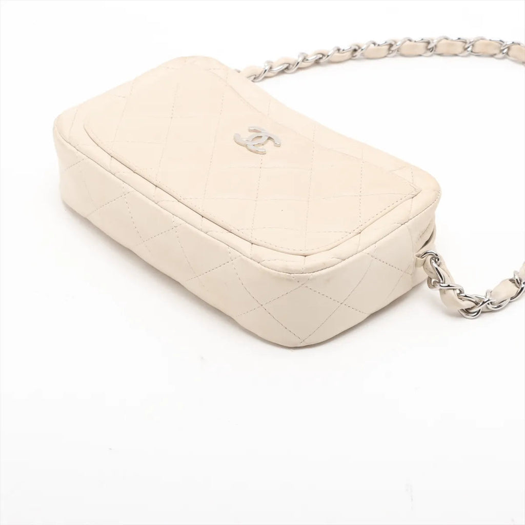 Chanel – Matelassé Camera Bag en cuir d'agneau – Beige – usure du coin droit