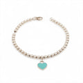 Tiffany & Co – Bracelet Return to Tiffany à billes & mini cœur émaillé – Argent 925 – photo 1
