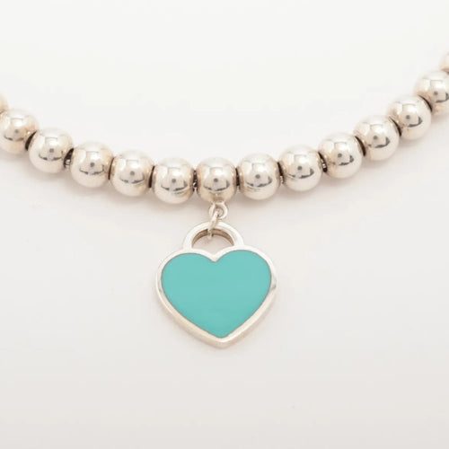 Tiffany & Co – Bracelet Return to Tiffany à billes & mini cœur émaillé – Argent 925 – photo 2